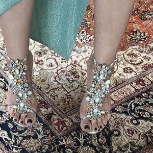 Rene caovilla bejeweled sandals.